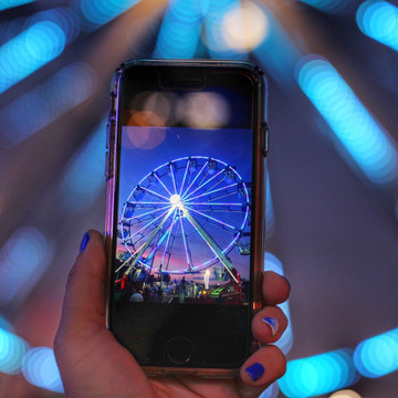 Taking a walk through a local summer carnival reminds me of being a kid again. Stopping to take in the the sight and beauty of the Ferris wheel.  "I see nothing in space as promising as the view from a Ferris wheel"