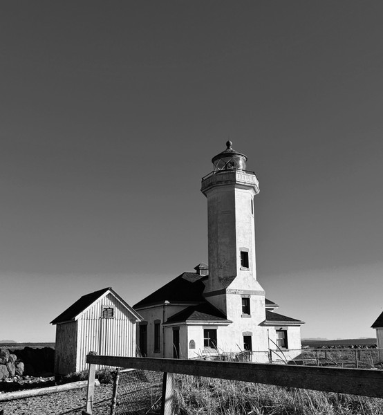 Pam Sproul — A beautiful clear sky contrasting with this historic lighthouse ~ lends itself to a sentinel sepia view

“Sentinel”-2026
