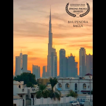 This was shot from the Tolerance Bridge at the Dubai Water Canal. The sunrise colors right behind the Burj Khalifa looked like that someone has painted the sky with different shades of colors. The moment I saw this masterpiece I knew this is the moment.  