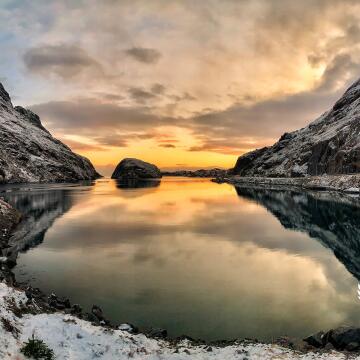 Nusfjord, Lofoten Norway<br />
Arriving in Nusfjord, a beautiful little town in Lofoten, the view suddenly widens towards the fjord and towards the town and the sea.  And if the sun is at sunset it becomes very very suggestive.<br />
Arrivando a Nusfjord, bellissimo paesino delle Lofoten, improvvisamente la vista si allarga sul fiordo verso il paese e verso il mare. E se il sole è al tramonto diventa molto molto suggestivo.