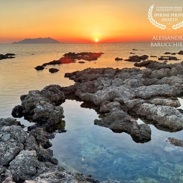 Favignana Island, Egadi archipelago, Sicily, Italy<br />
The Sicilian island juts out into the transparent and beautiful sea, towards another of the islands of the archipelago.  The sunset makes everything wonderfully sweet.<br />
Isola di Favignana, Arcipelago delle Egadi, Sicilia, Italia<br />
L’isola siciliana si protende nel mare trasparente e bellissimo, verso un’altra delle isole dell’arcipelago. Il tramonto rende tutto meravigliosamente dolce.