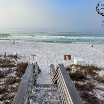 These wooden steps take beachgoers over the sand dunes onto the white sand beach of Destin on Florida's Emerald Coast, named after the emerald green waters of this part of the Gulf of Mexico.