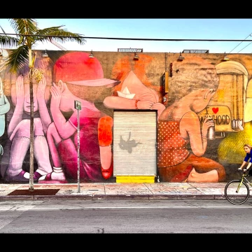 Wynwood Walls is a unique outdoor destination featuring huge, colorful street murals by artists from around the globe, in Miami, Florida