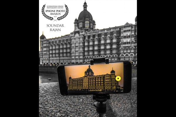 Well story behind clicking this photo came in my mind when I was shooting time lapse from my other phone. The moment I saw this frame in my #iphone I knew this is going to be one of the craziest shot I have done till now.<br />
So it’s #tajmahalhotelmumbai and it’s near #gatewayofindia and got an awesome view near ocean. Thank u so much for selecting and also will keep on clicking 