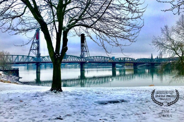 Driving through Portland Or-stopped for lunch along the Willamette River, trekked out in the snow to try to capture the incredible light in the snow, river & sky.<br />
“Snow view on the Willamette”-2018