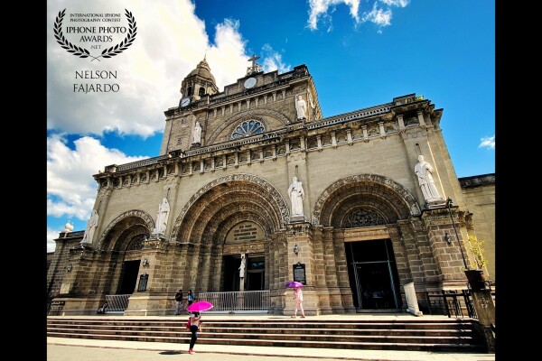 I took this picture while strolling along the city streets. It’s about noontime at the Manila Cathedral inside the historical walled city of Intramuros, Manila, Philippines.