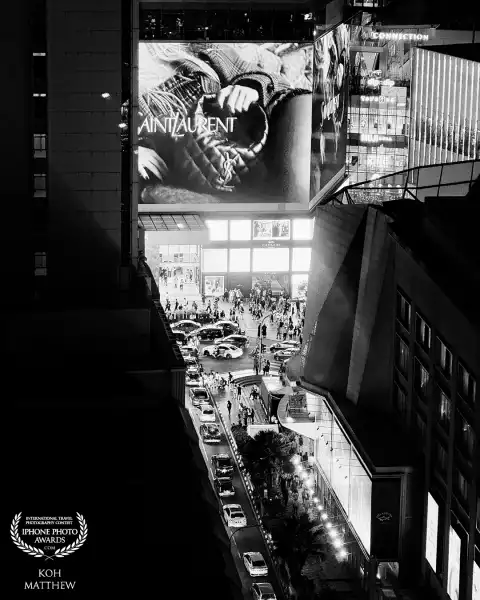 Window view of the hustle and bustle of the Bukit Bintang Street late into the night