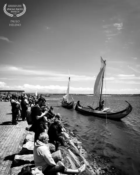 A moliceiro boat line up at the peer, in the town of Murtosa, near Aveiro, Portugal.