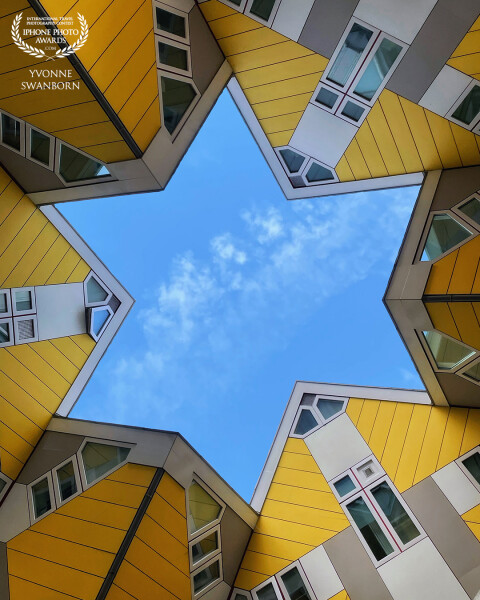 ‘Look up’ <br />
<br />
I joined a photowalk for mobilephotography, we walked along a lovely part of Rotterdam ‘de oude haven’ (the old harbor)<br />
These are the yellow cubehouses in Rotterdam, there is just one point, when you stand exactly in the midddle, you see the star above you.