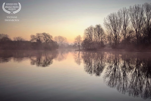 Walking my dog on a cold misty morning. I loved the mist and the reflections.