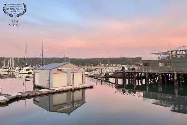 The boat house contrast with the soft pink sunrise ~ draws my eye <br />
“Pink sunrise boathouse”-2024