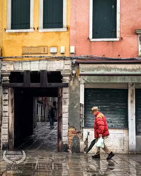 A rainy street scene, Venice, Italy.
