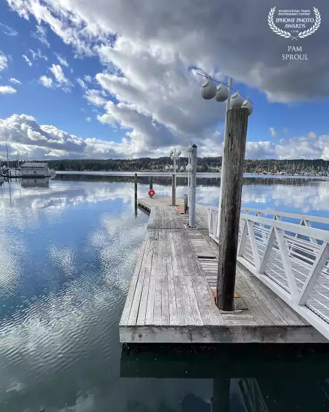 The angle of these clouds juxtaposed against the dock draws your eye into the beautiful bay <br />
<br />
“Cloud dock Bay view”-2024