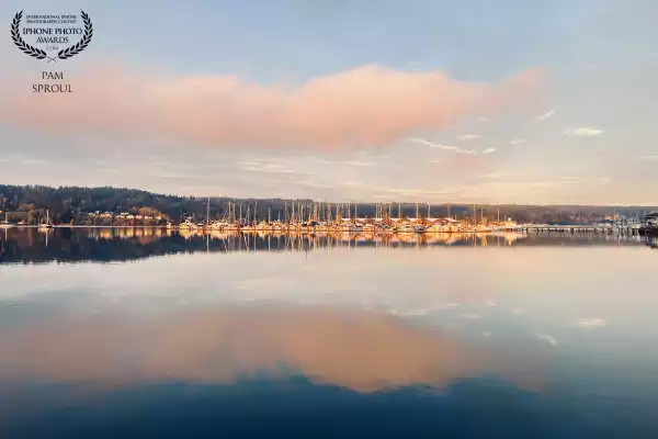 Fog rising to this beautiful sky and the clouds reflecting off of the water and marina creating a beautiful golden autumn hue<br />
<br />
“Fog rising Autumn Hue on the bay”-2025