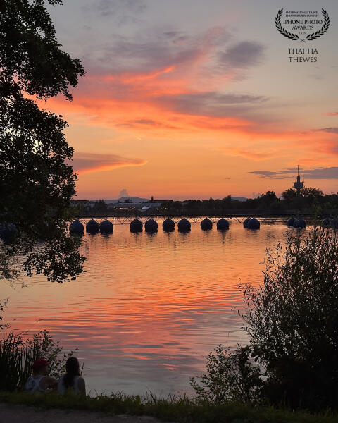 Beautiful sunset colors at the lake Flückiger See, Freiburg, Black Forest, Germany.