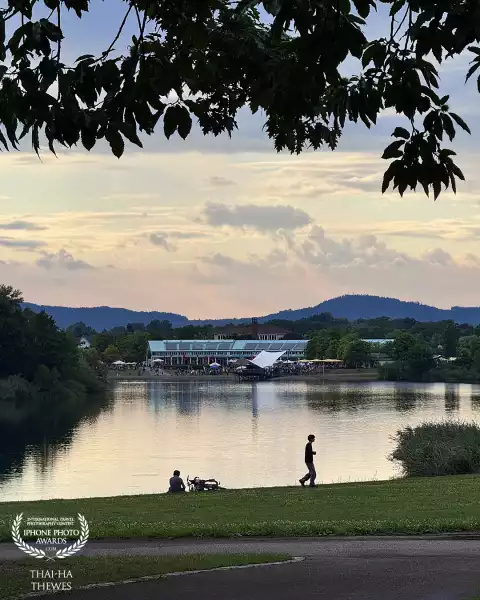 View of the lake Flückigersee in the evening before sunset. Freiburg, Black Forest, Germany.