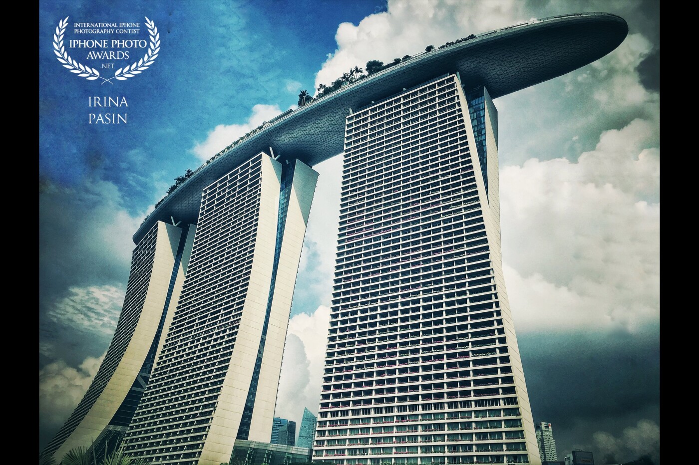 Singapore's one of the most famous buildings - Marina Bay hotel. Spectacular even more so up close. Like a ship sailing through the sky.