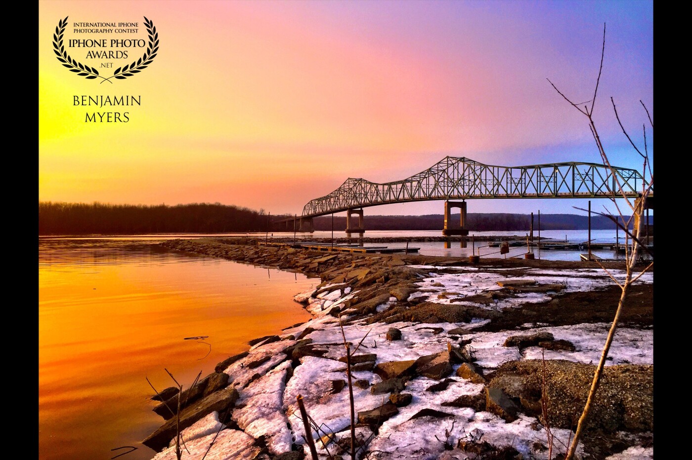 This shot was taken at sunset in Lacon, Illinois. The bridge crosses the Illinois river and has been the star of many photos taken by a fellow photographer. The calm river was mirroring the sky and we sat there taking photos until the sun had completely settled out of sight. Thank you for sharing this spot @ travisguthmanphotography! 