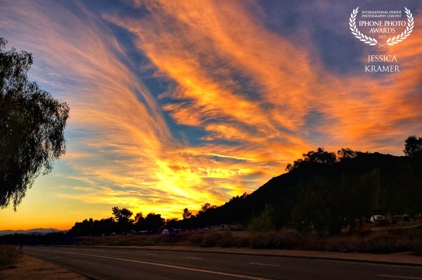 “Only from the heart can we touch the Sky.” - Rumi<br />
A beautiful sunset, peacefully flowing through the clouds, over Lake Perris, California 