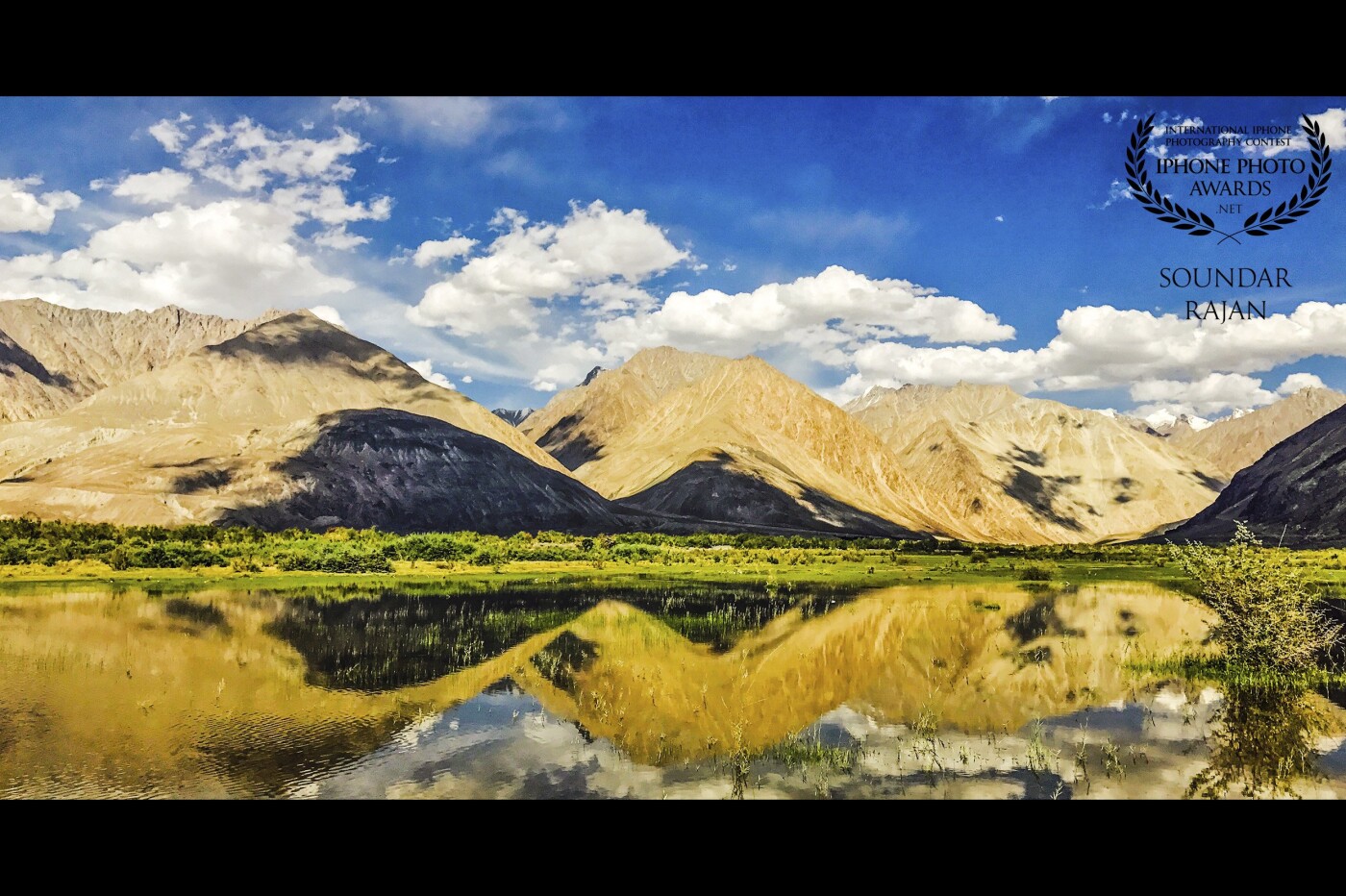 On my way, Nubra valley, this mirror imaging of a lake gives us an amazing shot and it is photographer paradise <br />
<br />
Ask anyone who clicks, they would have stopped at this stop to shoot 