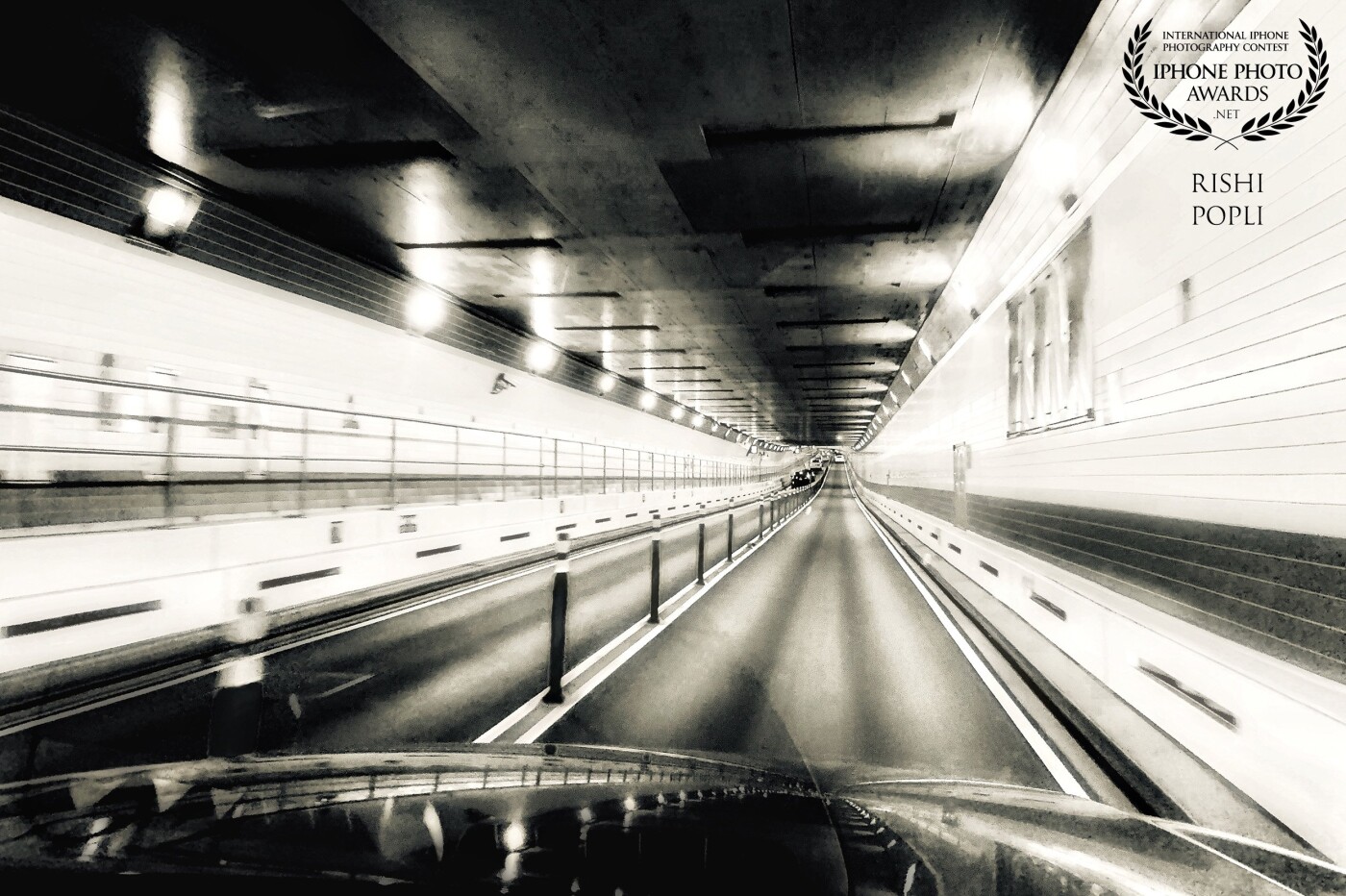 Driving down after an evening of fun and drinks with the people I love from @PinderWinery in LongIsland, New York. I took this picture from the passenger seat of my car while driving through the Midtown Tunnel. 