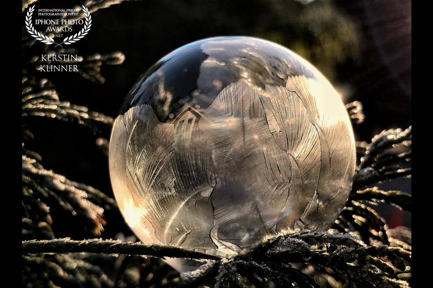 It was a very cold morning and completely windless - the best conditions to freeze soap bubbles. The picture was taken with an iPhone 7 Plus.