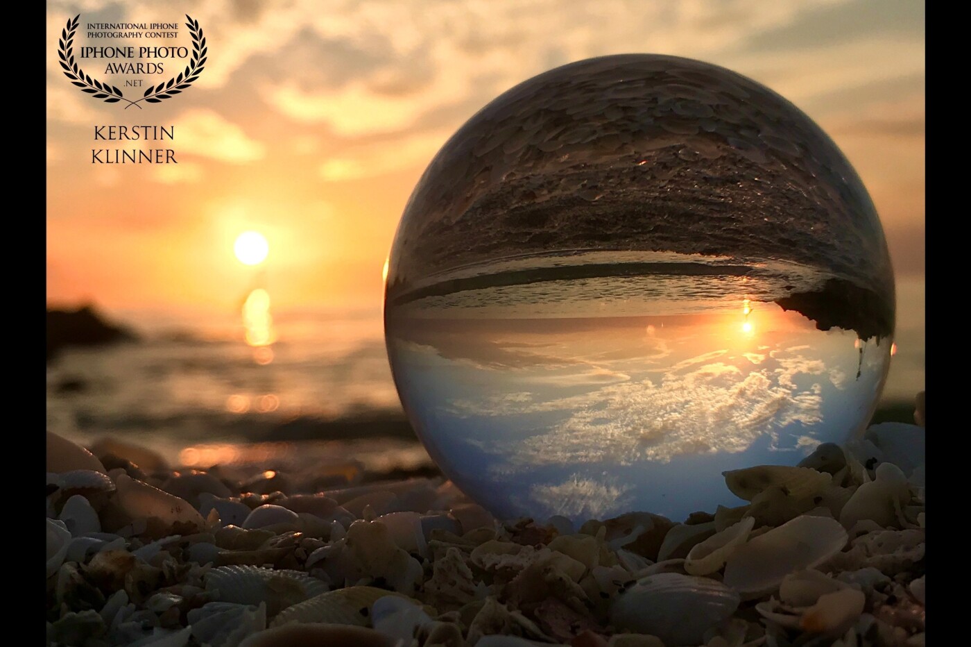 This sunset reminds me of a time when traveling was still possible. The glass ball is located at one of the most beautiful beaches of Florida - Turner Beach at Captiva Island.
