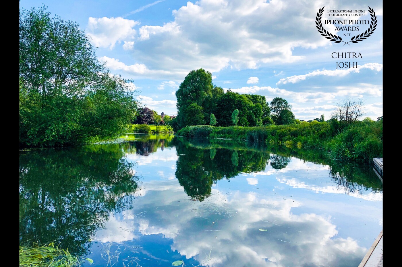 I clicked this beautiful scene at St.Nicholas Park, Warwick, United Kingdom where I used to go for a walk and sit down near Avon river to reflect on myself through the reflection of nature. "Nature admiring herself in the mirror"!