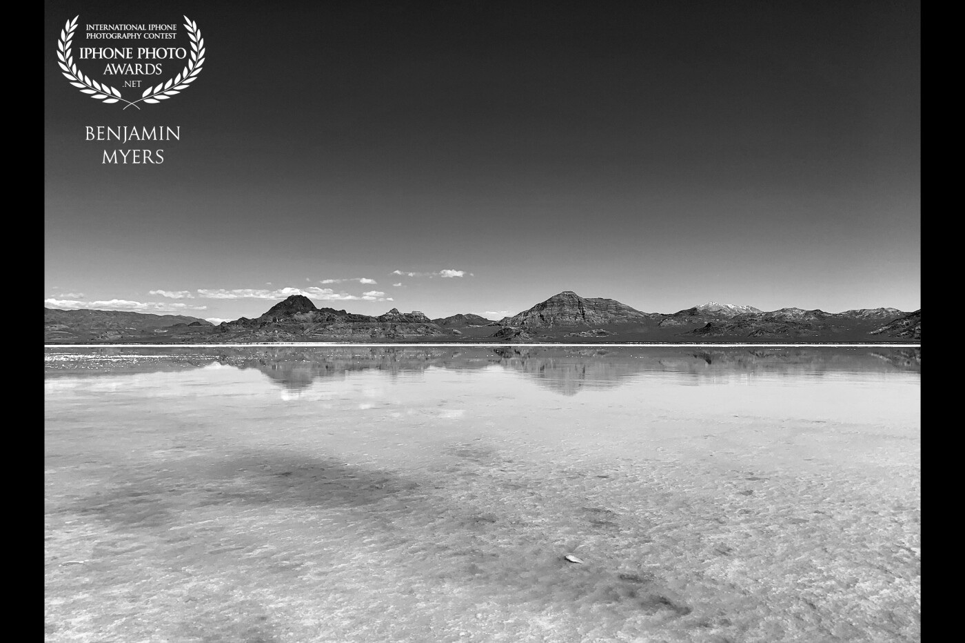 I took this photo when traveling through Utah back to California last summer. It’s worth a detour to drive out to the salt flats that are a few miles off of I-80. One day I’d like to race there. It looks otherworldly in black and white.