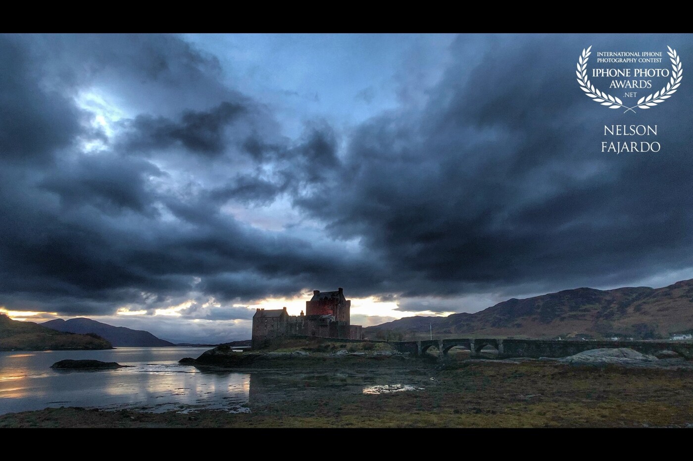 At dusk in Scotland’s Eilean Donan Castle with storm cloud coming in from the Atlantic Ocean. The castle was picture perfect at any time of the day.