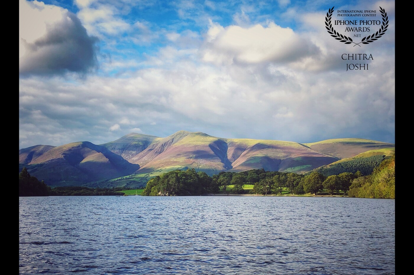 "Majestic Mountains" I clicked this picturesque scenery at Derwent Water, Lake District, United Kingdom while enjoying the soothing sounds of the lake and echoes of mountains. 