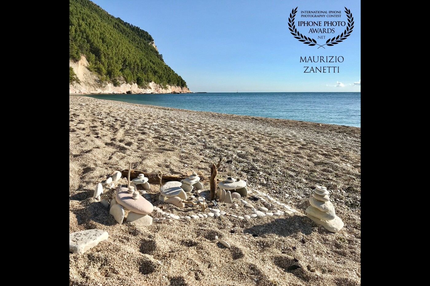 Sirolo, Conero Riviera, San Michele beach. Before the tourists arrive you can still admire the compositions left the previous day. Small constructions of land art, without pretending to be...