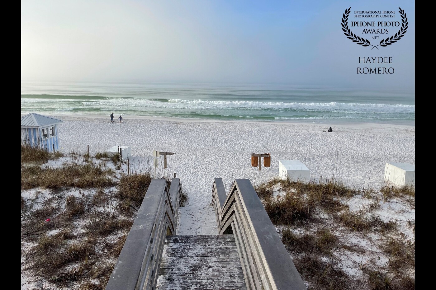 These wooden steps take beachgoers over the sand dunes onto the white sand beach of Destin on Florida's Emerald Coast, named after the emerald green waters of this part of the Gulf of Mexico.