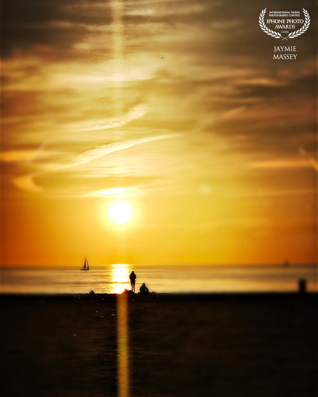 When the weather is nice people take advantage of a beautiful sunset. This beach, in The Hague, Netherlands attracts people from all over to also enjoy its restaurants and shops.