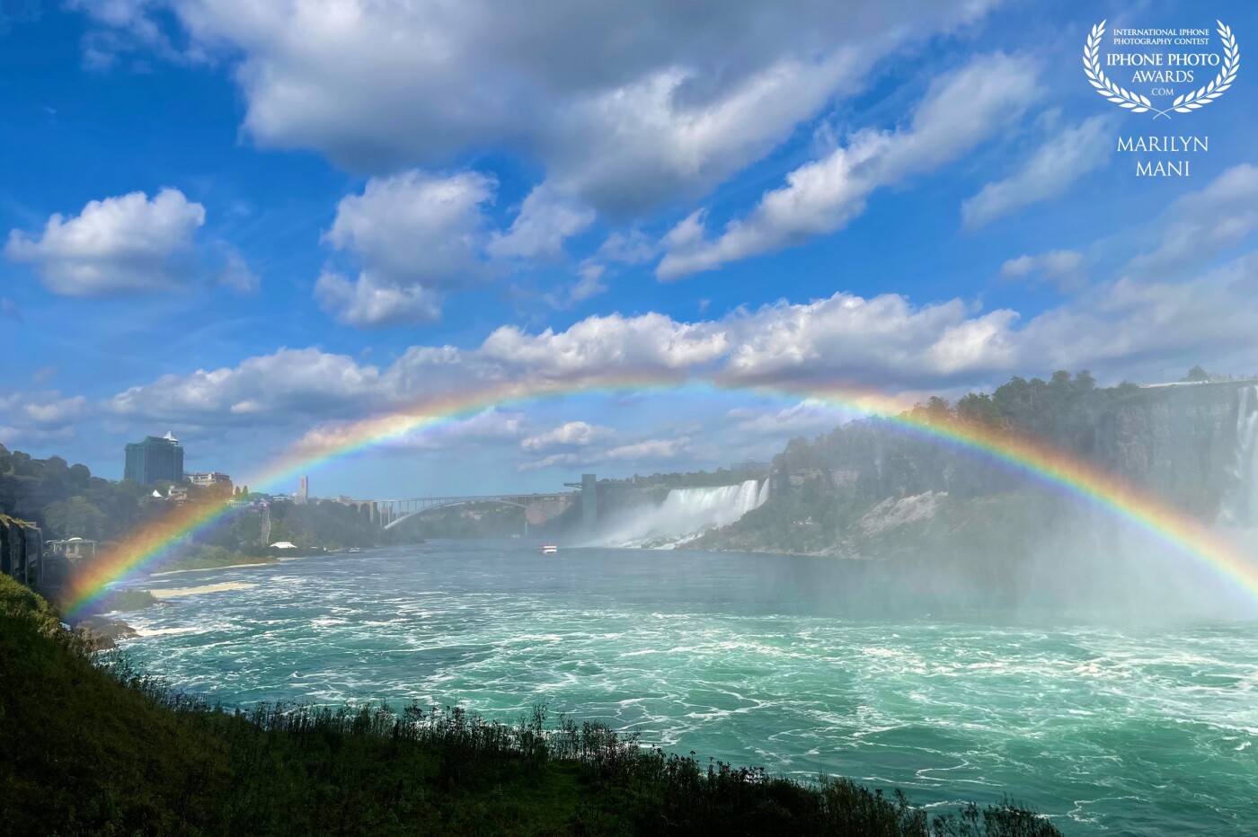 The perfect rainbow captured on a perfect day at the perfect moment at the Niagara Falls, Canada. Being able to capture such magnificent gifts of nature is what I cherish as a photographer.