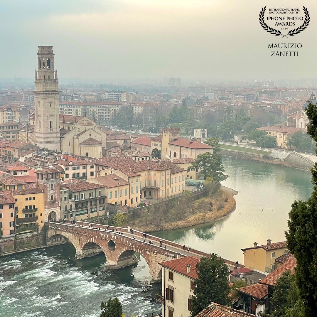 Even on a gray winter day, the beautiful Verona can give splendid images. Photo taken from the top of Castel San Pietro, towards the ancient Ponte Pietra and the Duomo.