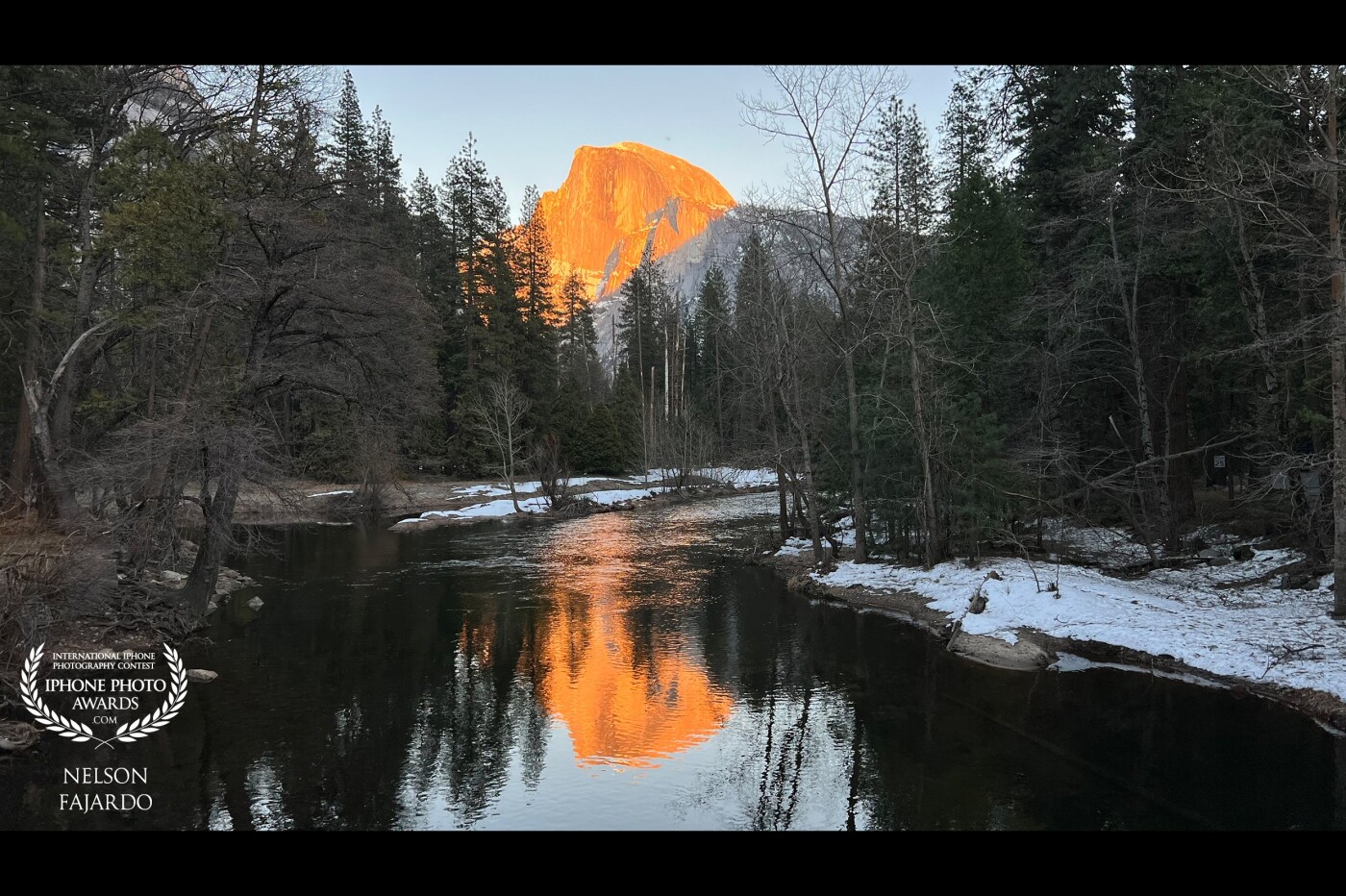A beautifully reflected half dome on the Merced River as the sun sets from the Yosemite National park captured here with no edits required shot.