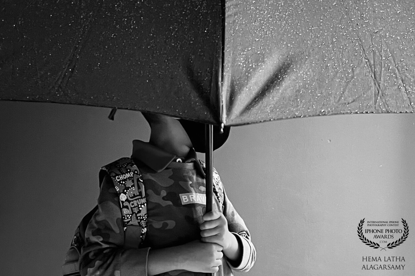 Heavy rains remind us of challenges in life. <br />
Never ask for a lighter rain. Just pray for a better umbrella… As a person who loves the rain, I’m glad my son enjoys them as well. Maybe one day, we’ll even dance in the rain…