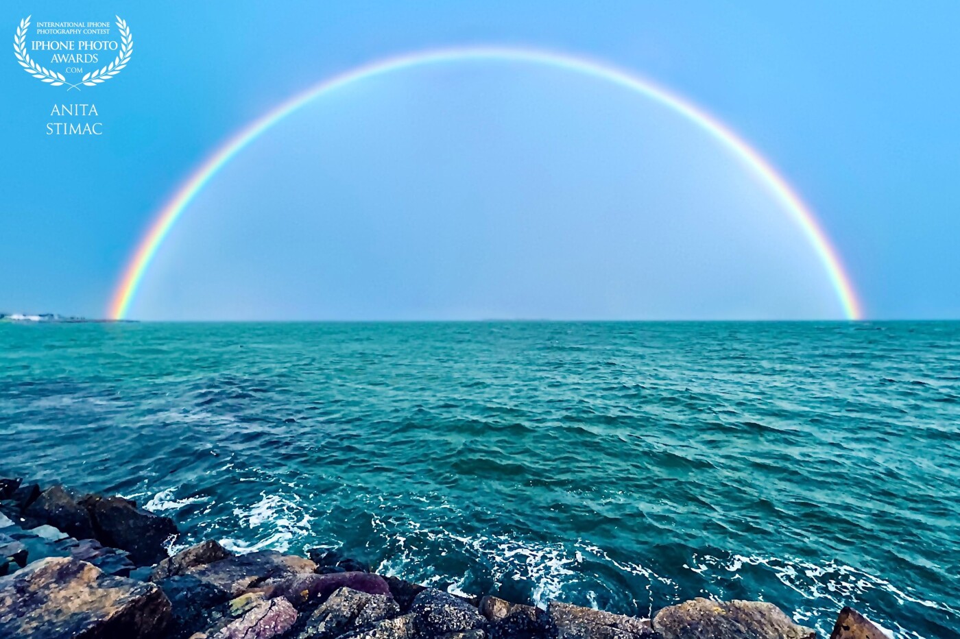 “Somewhere over the rainbow, skies are blue, and the dreams that you dare to dream really do come true.” <br />
<br />
A perfect rainbow on Galway Bay over the Atlantic Ocean.