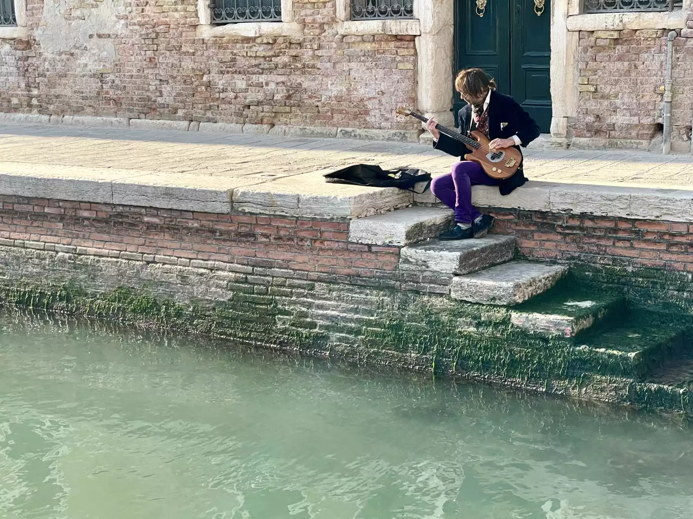 Venice. On the bank of one of its canals (here the banks are called 'fondamenta') in a quiet area, a...