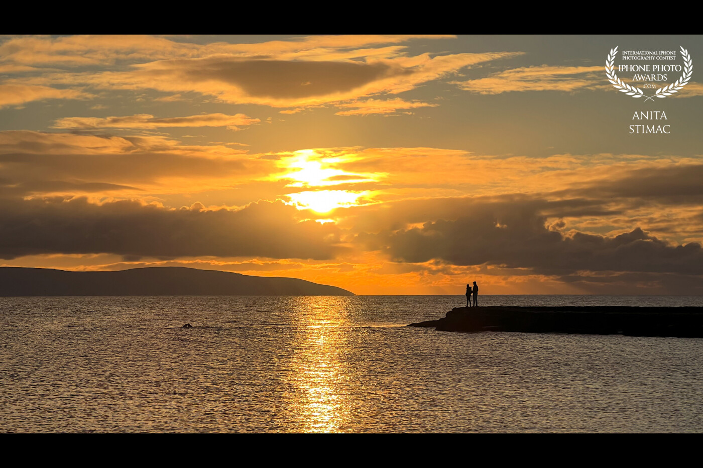 The stunning seascape of Salthill overlooking Galway Bay in the golden hour.