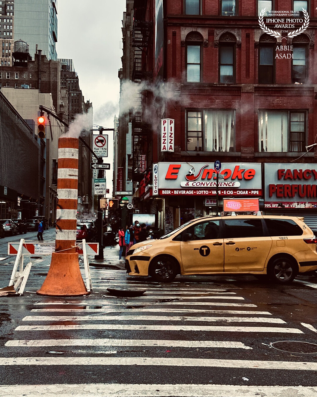 New York City. How many cliches can we fit into one photograph?