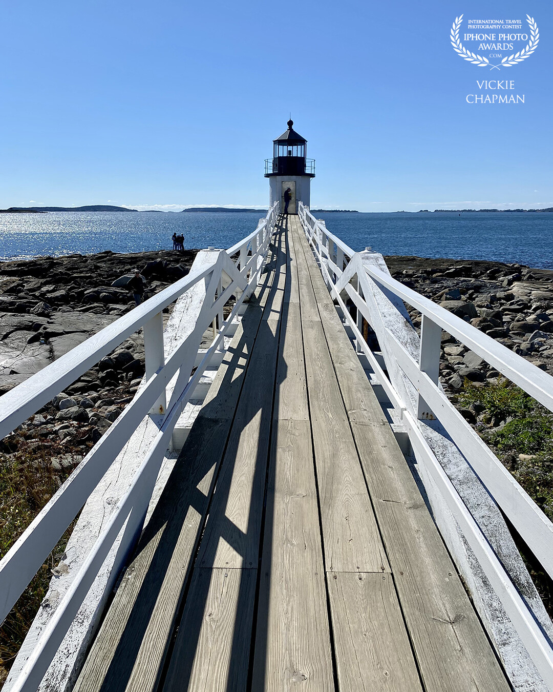 The Marshall Point Lighthouse gave me some wonderful leading lines. I really loved how the shadows made the white railings pop!!