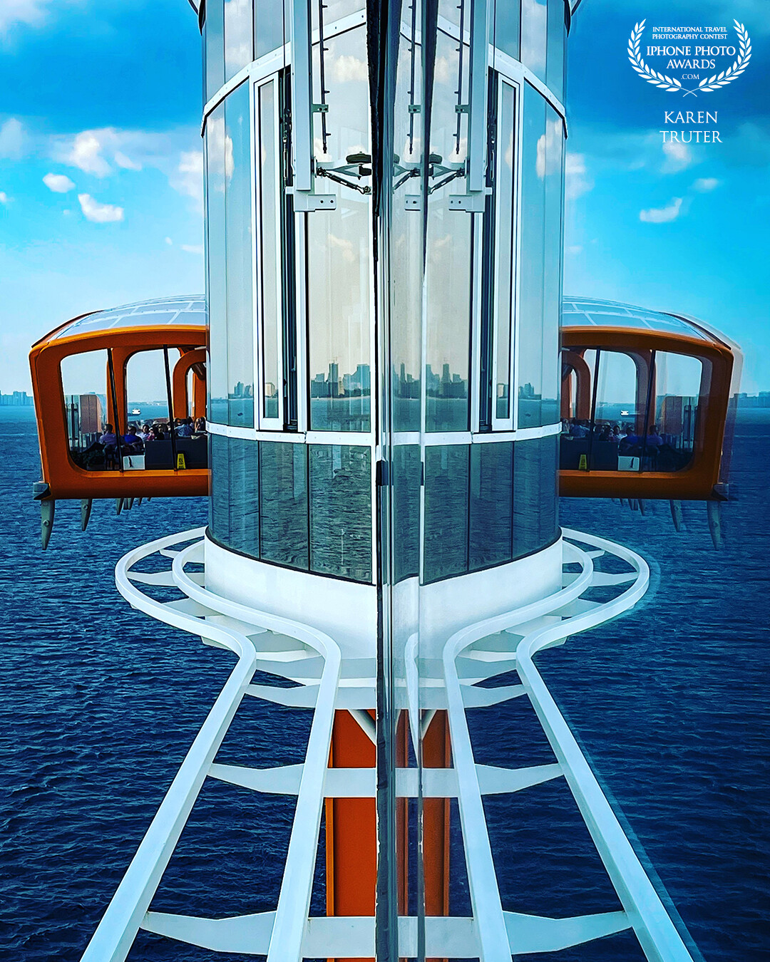 The orange platform restaurant is called the ‘Magic Carpet’ on the Celebrity Apex cruise ship and hangs over the side suspended over the ocean. I rested my camera against the window to capture this mirror image as we sailed out of Fort Lauderdale.
