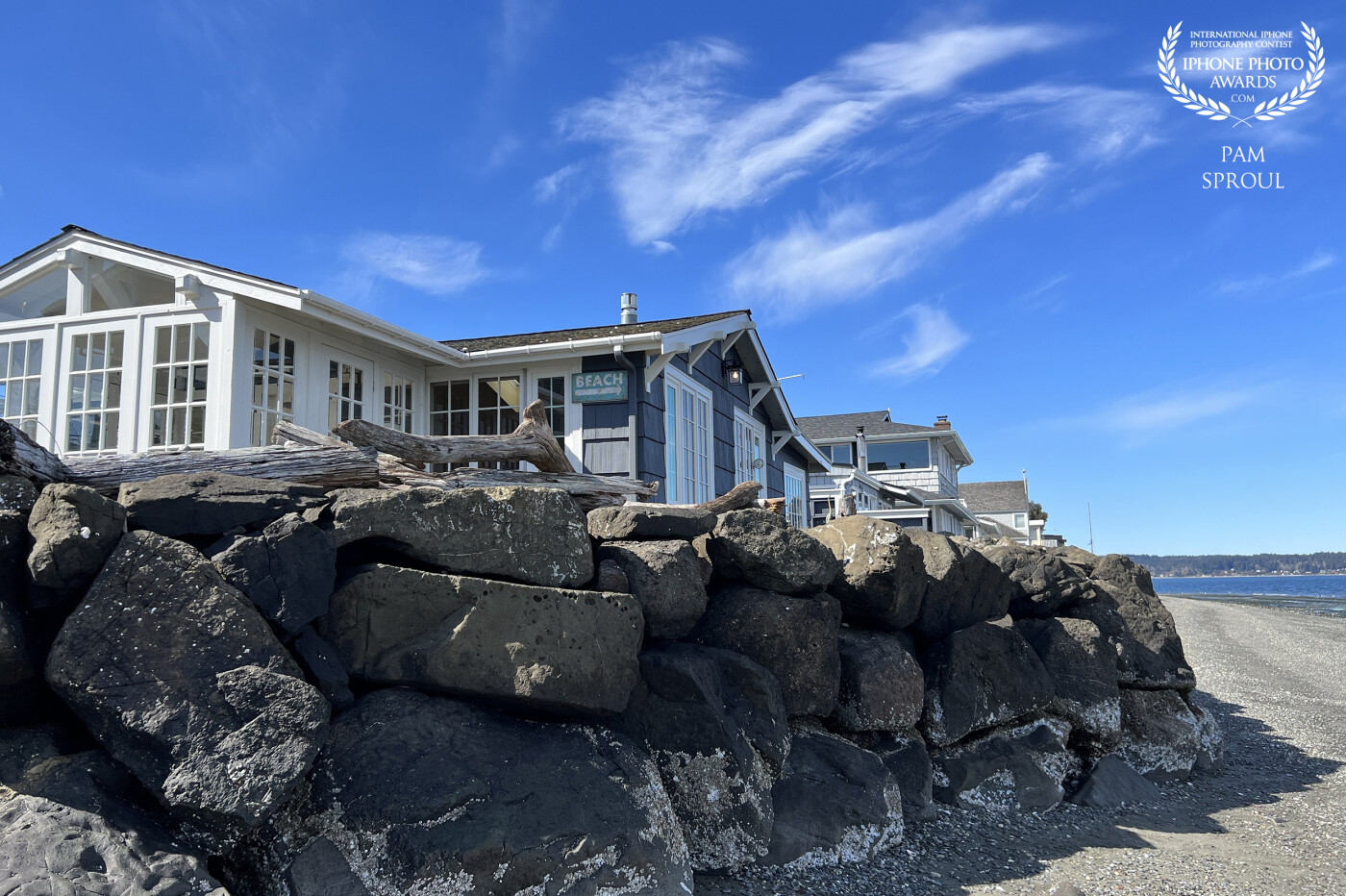 On a beachwalk on a sunny day in the Pacific NW and I glance up and see the Beachhouse set against a crystal blue sky, loved the contrast <br />
<br />
“Beachhouse Fay Bainbridge”-23