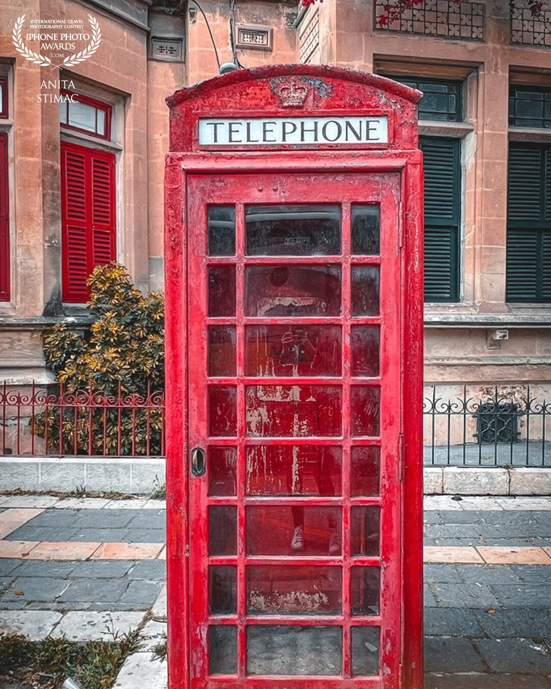 A red telephone box in Rabat, Malta.