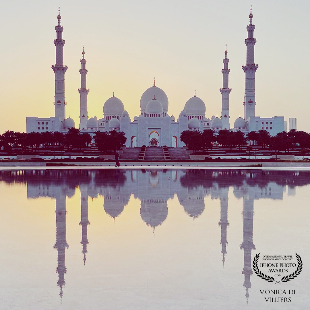 Sunset reflection of the Sheikh Zayed Grand Mosque, Abu Dhabi.