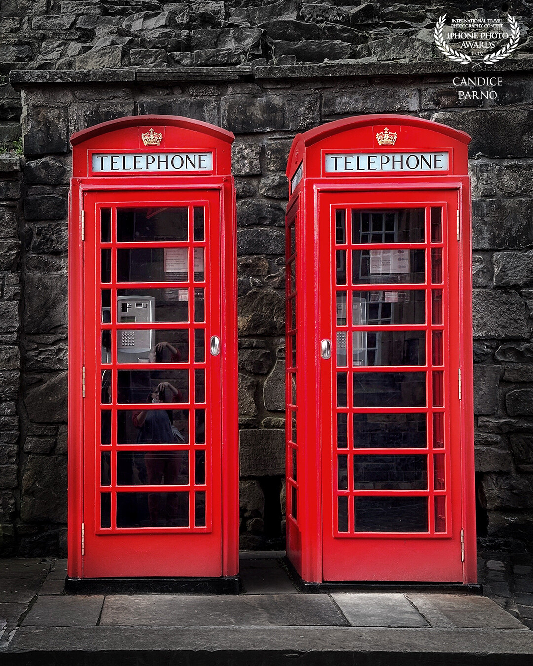 Red phone booths have always been fun to capture. These 2, side by side, gave the photo that extra symmetrical feel.