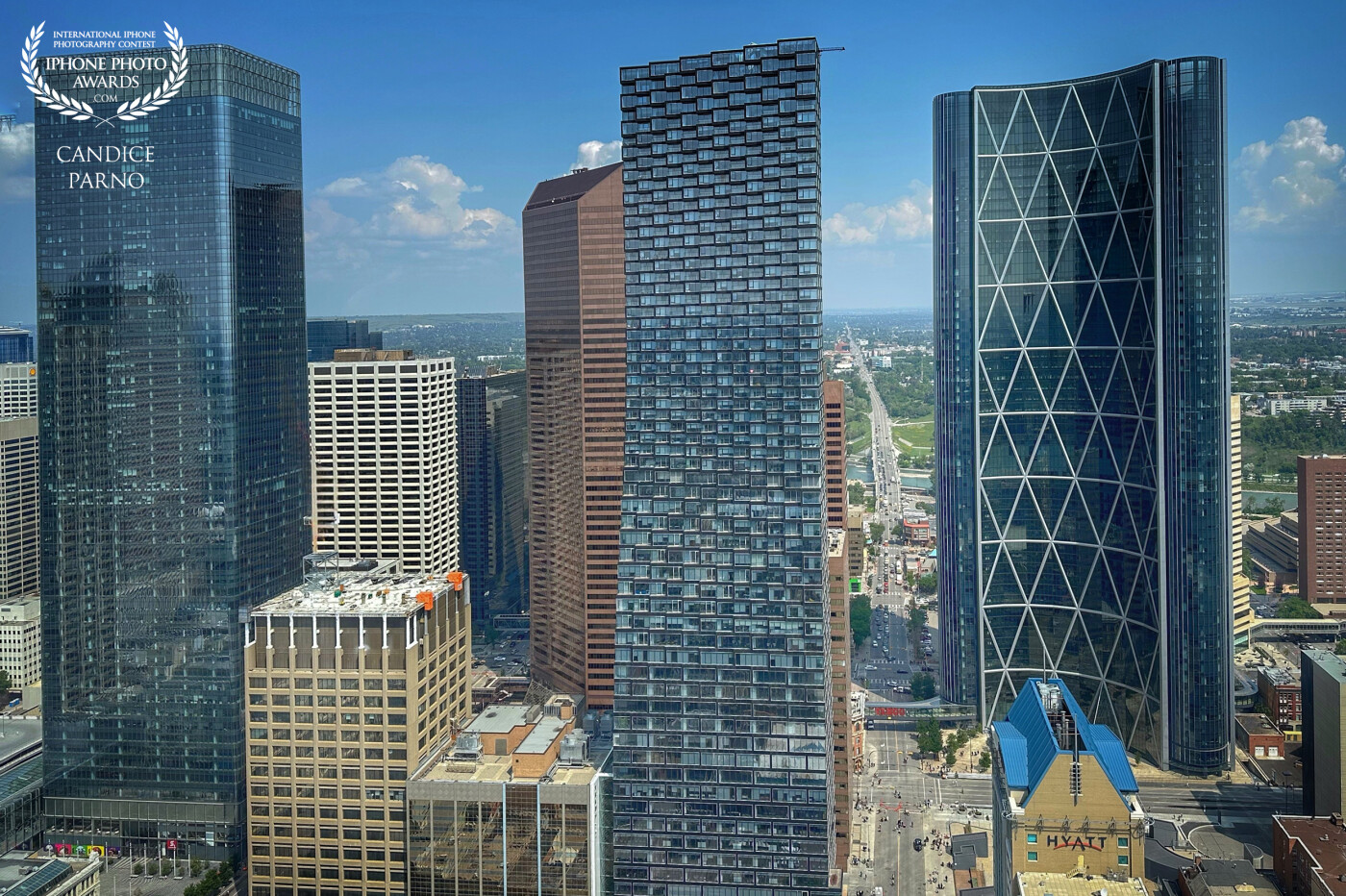 I love the geometry of downtown Calgary buildings… squares, rectangles and triangles.  Seen from the top of the Calgary Tower.