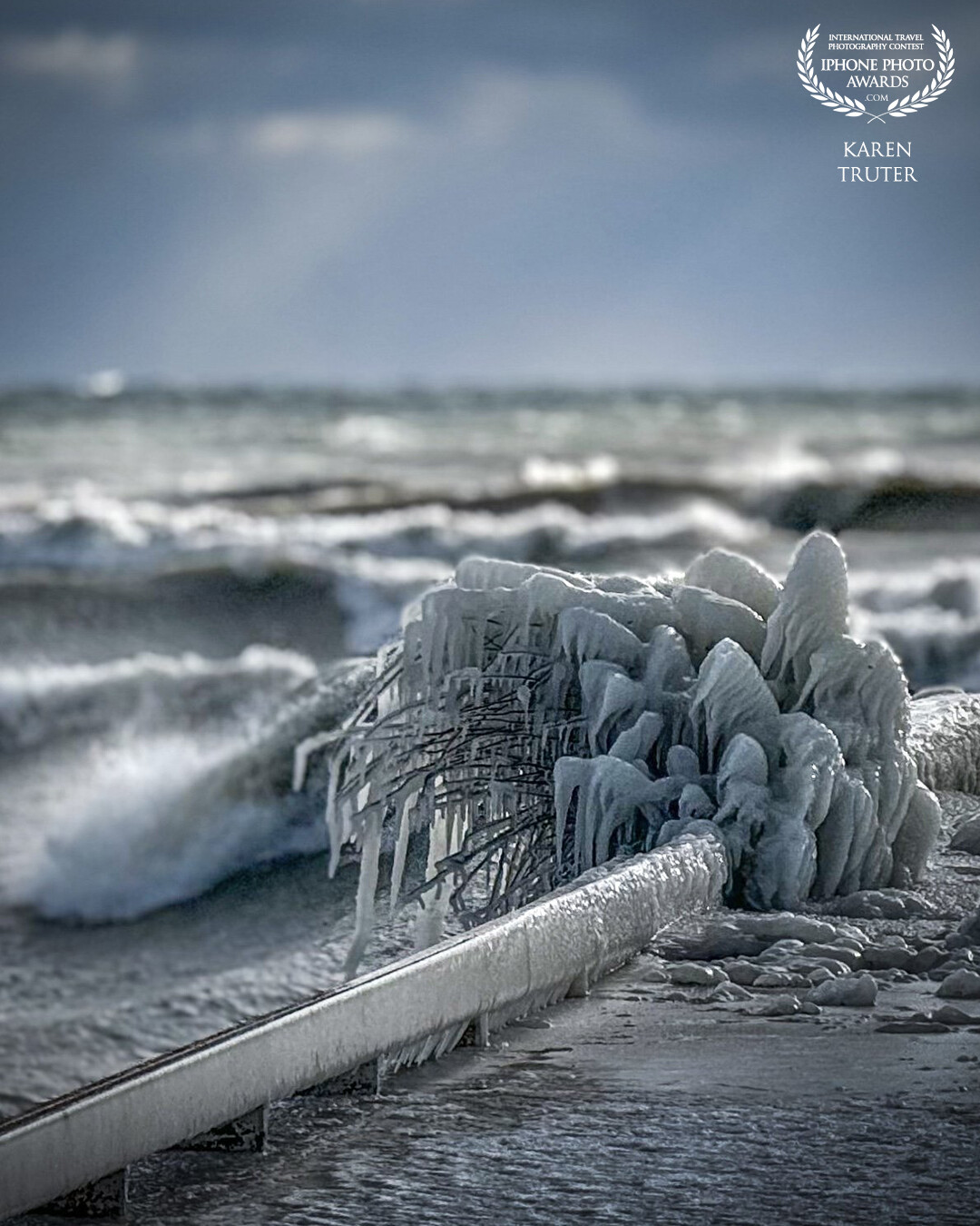 Ice formation on the end of the pier formed by wind and waves on Lake Ontario.
